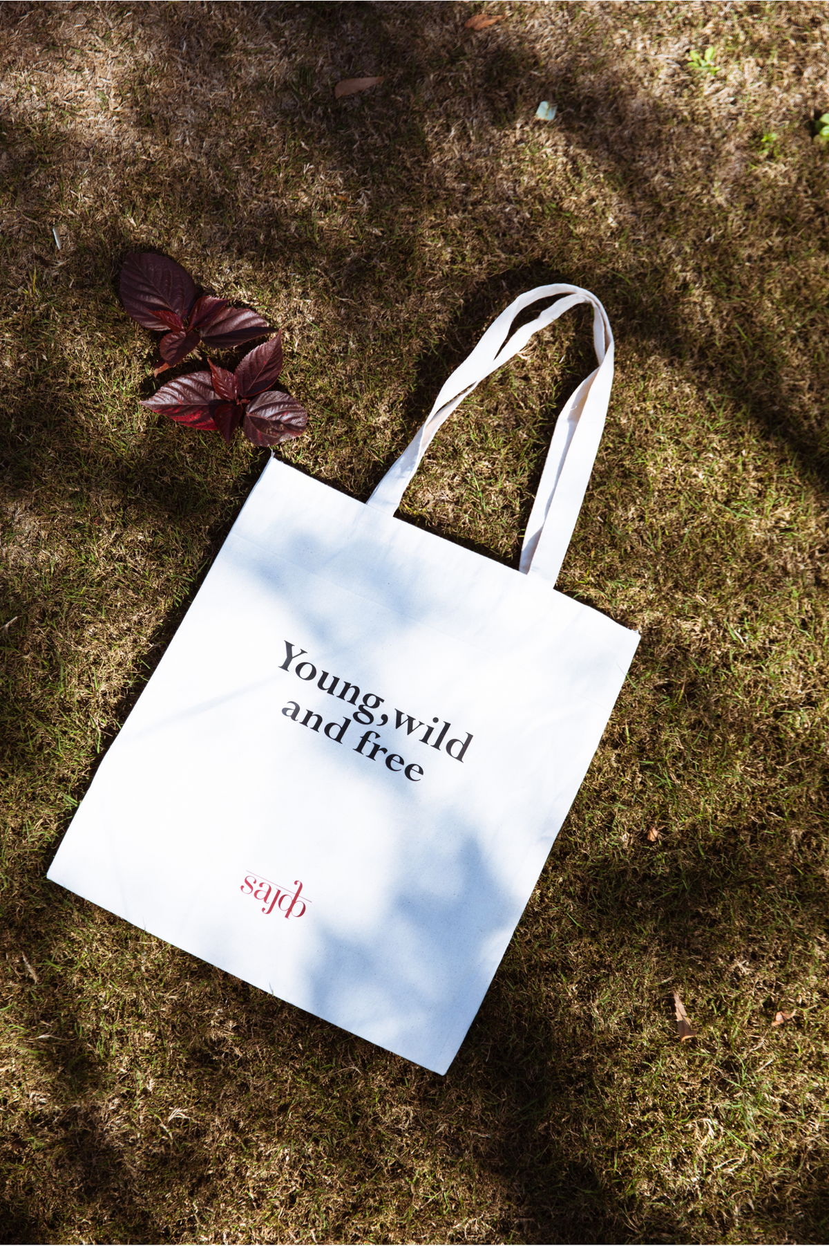 Young Wild Free Tote Bag
