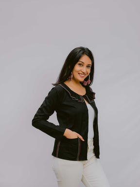 Black jacket with ruffled collar