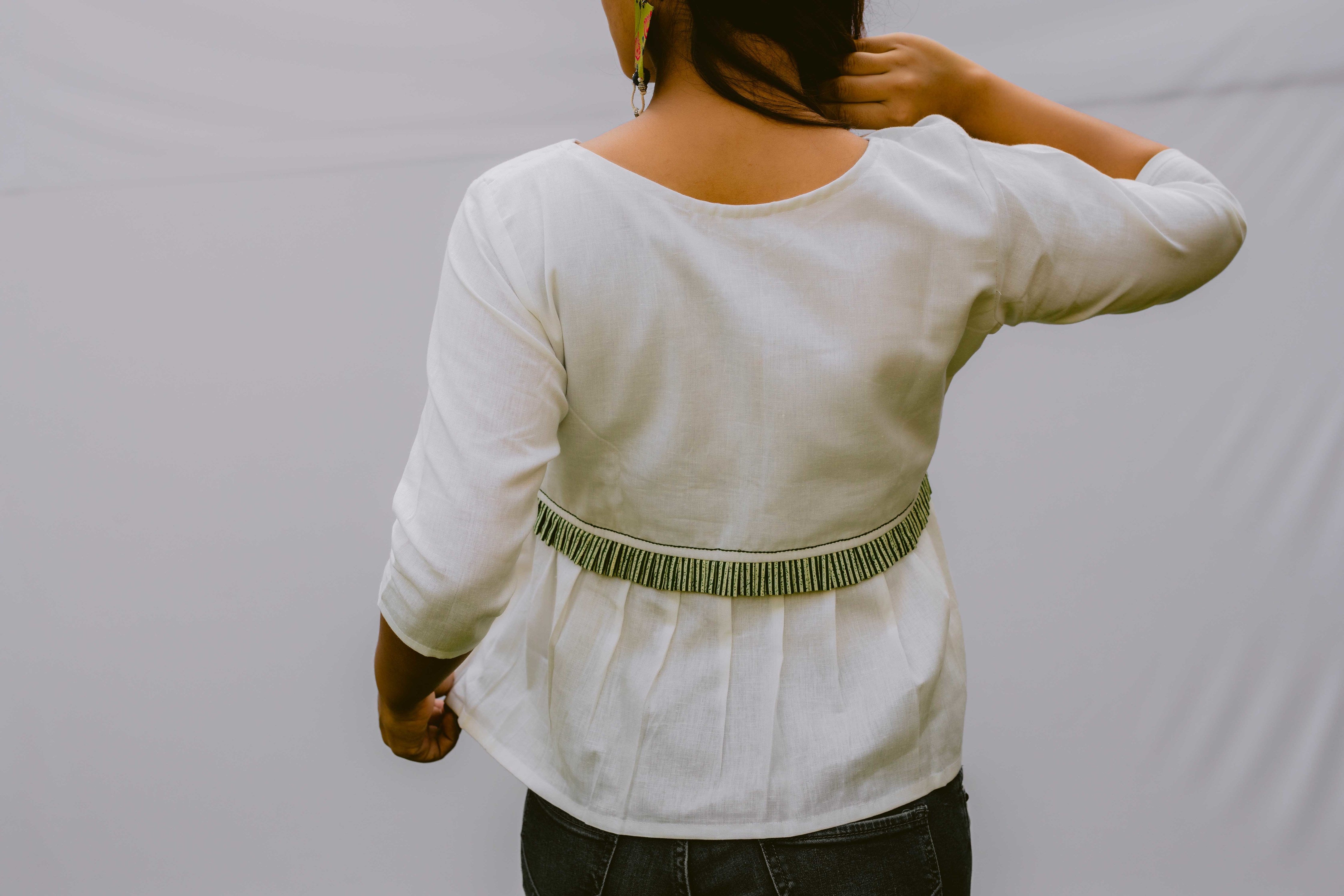 Off White Peplum Top With Wooden Buttons